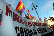 Una de les pancartes que han encapçalat la manifestació, l'1- d'ocubre a Madrid.