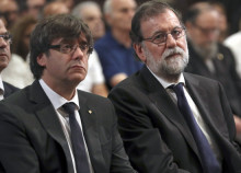 Pla mitjà del president, Carles Puigdemont, i el president espanyol, Mariano Rajoy