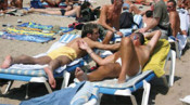turista gay gai homosexual platja