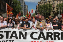 Els dos líders sindicals de CCOO i UGT, Joan Carles Gallego i Josep Maria Àlvarez, a l'inici de la manifestació del Primer de Maig del 2013. Rere d'ells, Pere Navarro del PSC i Oriol Junqueras d'ERC, amb altres polítics dels dos partits