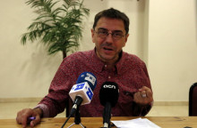 El cofundador de Podem, Juan Carlos Monedero, atén la premsa al local de l'Associació de Veïns i Veïnes del barri del Bon Pastor
