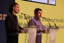 El president d'Òmnium Cultural, Jordi Cuixart, i el president de l'ANC, Jordi Sánchez, al Centre Internacional de Premsa
