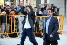 Jordi Cuixart i Jordi Sànchez, en el moment de la seva arribada a l'Audiència Nacional per declarar per sedició