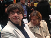 Carles Puigdemont i Carme Forcadell, en la seva arribada a l'assemblea general de l'ANC