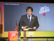 El cap de llista de JxCat, Carles Puigdemont, intervé des de Brussel·les a l'acte de la candidatura a Igualada