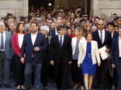 Carles Puigdemont amb Oriol Junqueras i Carmes Forcadell