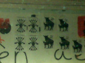 El jou i les fletxes de Falange sobre el mural de la consulta © SFC Decideix