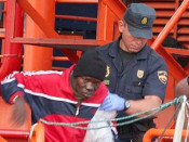 policia espanyol, CNP, immigrant, sense papers